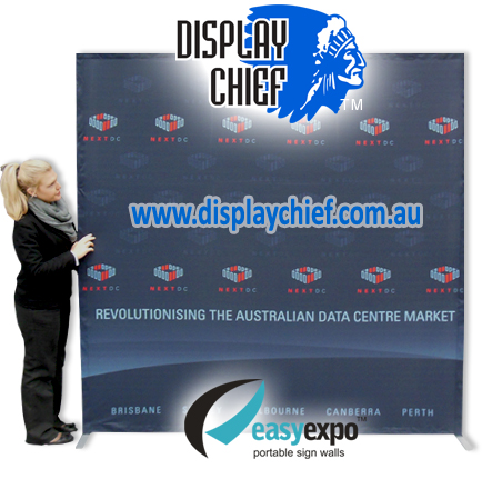 Lifesize comparison of the pop up sign wall with printed fabric banner fitted and frame expanded into full size